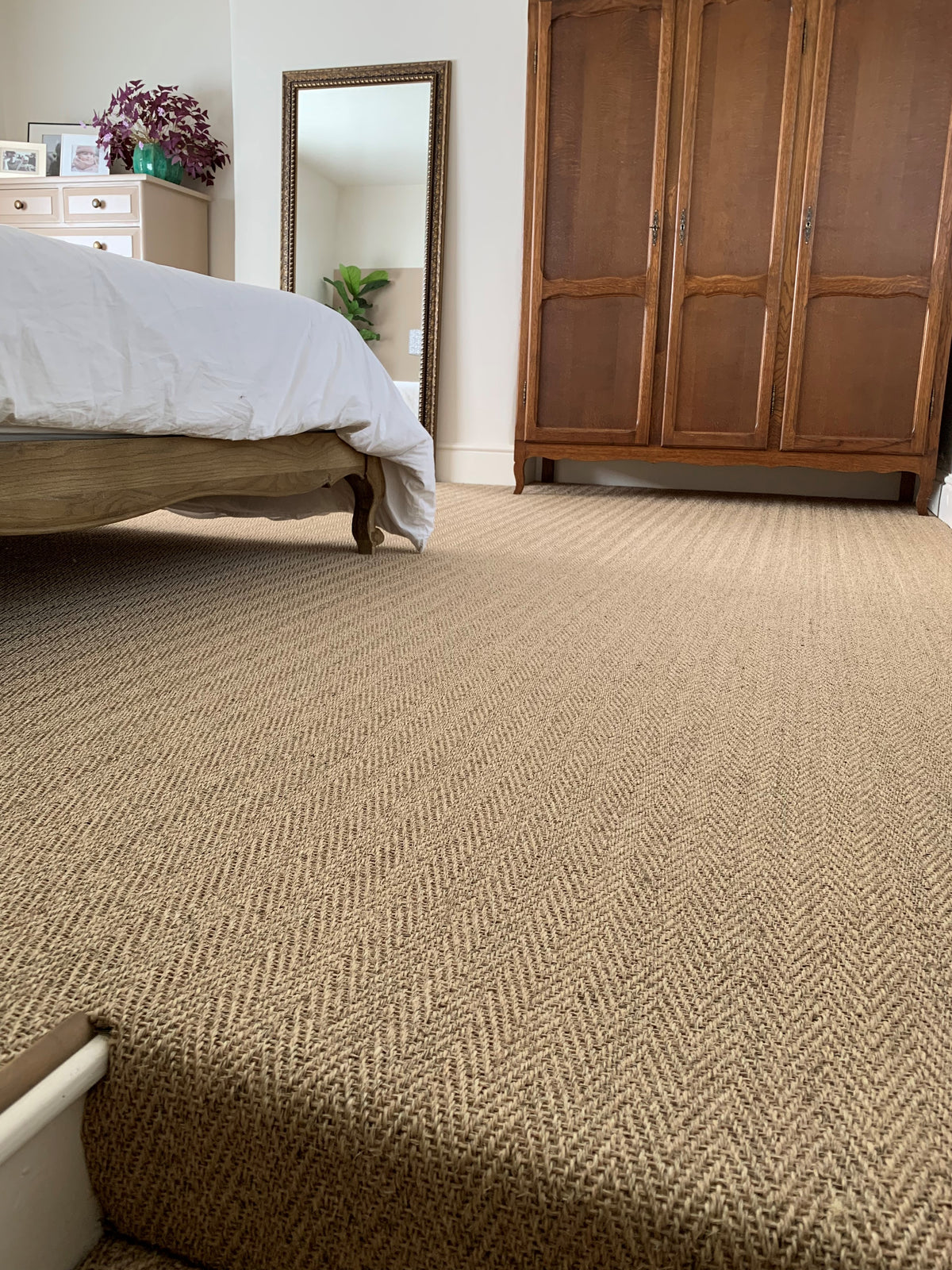 Sisal Herringbone Carpet in a bedroom